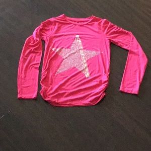 Pink long sleeve with silver star.